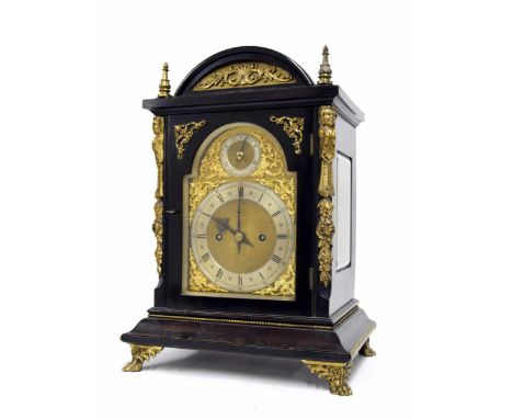 Ebonised double fusee bracket clock, the 6" brass arched dial with silvered chapter ring enclosing a matted centre, with subs