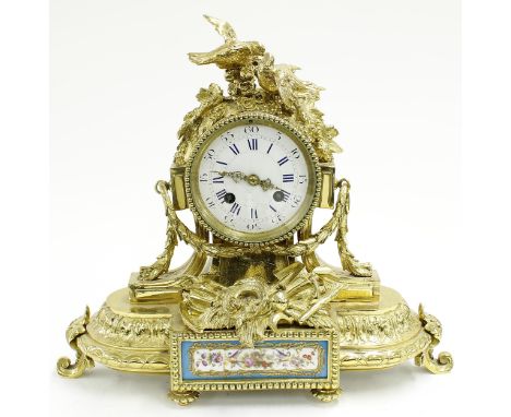 French style gilt metal and porcelain mounted two train mantel clock, the movement with outside countwheel striking on a bell