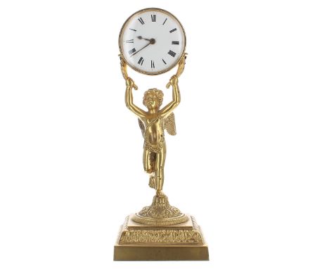 Small English ormolu figural desk clock timepiece, the watch movement signed on the back plate Henry Dobb, Helston, held alof