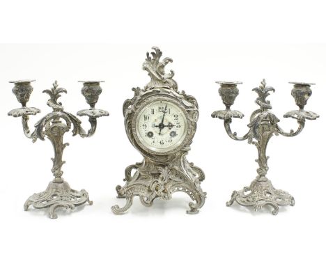 Decorative silvered two train mantel clock garniture, the Mougin movement striking on a bell, the 3.25" painted cream dial wi