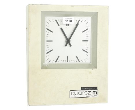 Patek Philippe Quartz-M English Clock Systems electric wall clock, the 6" square silvered dial within a cream metal case, 12.