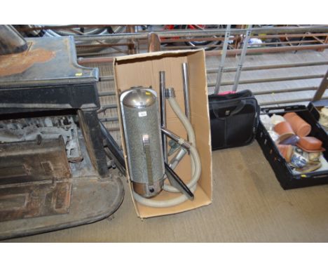 A vintage vacuum cleaner - sold as collector's item