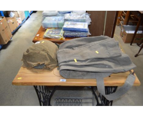 An army bag; together with a tin helmet