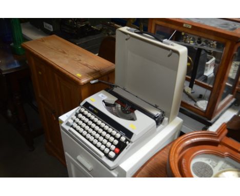 A Boots portable typewriter in fitted case 