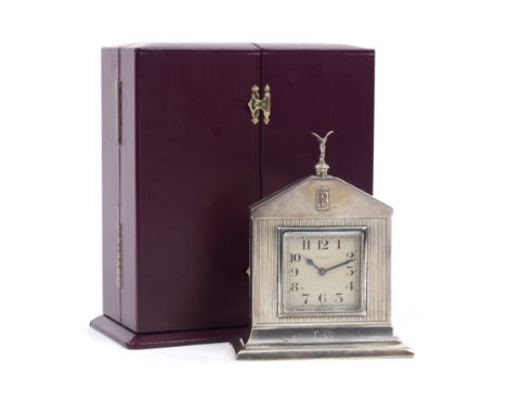 A Rolls-Royce desk-set Christmas gift for 1927, sterling silver clock by Saunders &amp; Shepherd,the 8-day brass-cased clock 