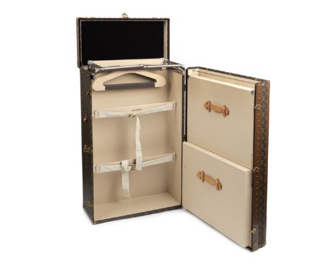 A Louis Vuitton Monogram Casier 85 wardrobe trunk,canvas case with LV monogram, lozine, brass rivets, locks, reinforced corne