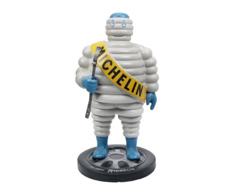 A hand-painted 'Mr Bibendum' standing forecourt display figure,modern, fibreglass construction, depicting the Michelin advert