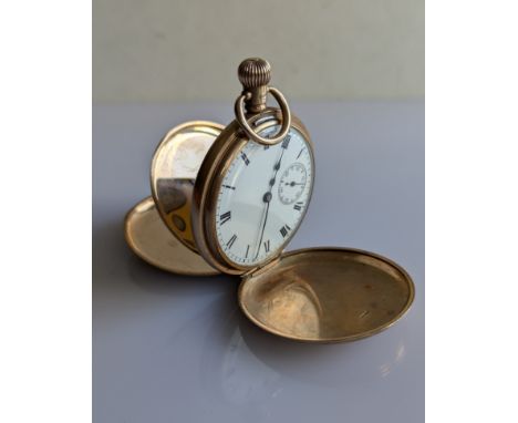 A George V 9ct yellow gold-cased full hunter, stem-wind pocket watch with Roman numerals, subsidary seconds hand, gold dust c