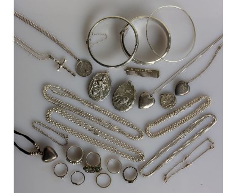 An assortment of silver based jewellery to include a Tiffany & Co. moustache comb, 45mm, pendants, pendant chains, bangles, b