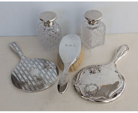 A pair of Victorian silver-topped hobnail cut glass, square-based scent bottles, one stopper missing, chip to rim, hallmarked