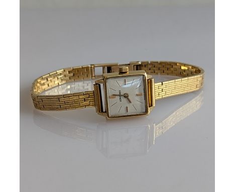 A mid-century ladies Longines dress watch with baton markers, 18ct gold case and fancy-link strap, 21g without mechanism, Swi