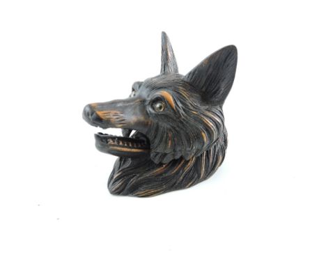A carved Blackforest style inkwell in the form of a fox head, H. 8cm.
