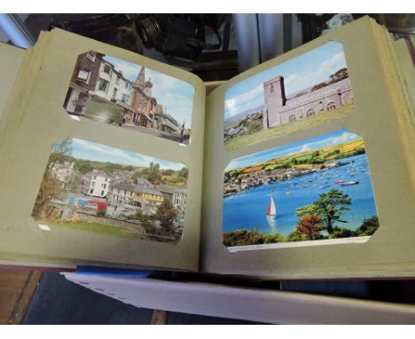 Five postcard albums with many hundreds of postcards, mostly modern GB topographical