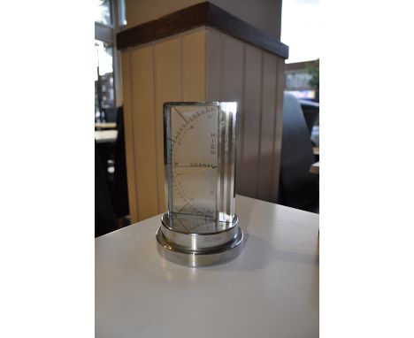 A 1950s Zeiss Ikon chrome cased desk barometer, h:16cm
