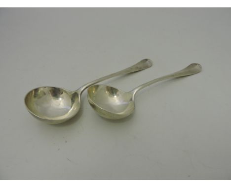 A pair of silver rat-tail ladles, Sheffield 1923 by Harrison and Howson, 6.58ozt. 