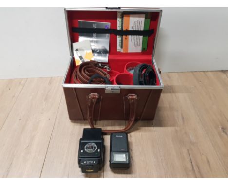 A VINTAGE LEATHER CAMERA CASE CONTAINING CANON FLASH AND MIRANDA 130M FLASH