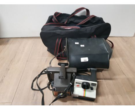 A BAG CONTAINING CAMERA BAGS AND 2 POLAROID LAND CAMERAS