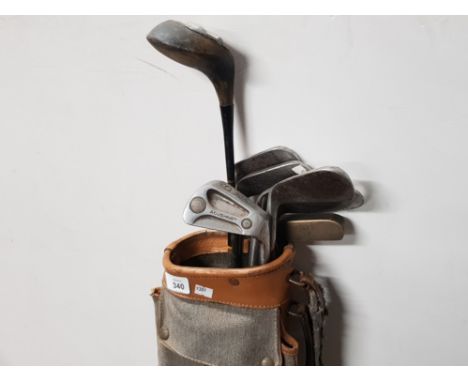 VINTAGE GOLF BAG CONTAINING CLUBS DRIVER, PUTTER AND IRONS