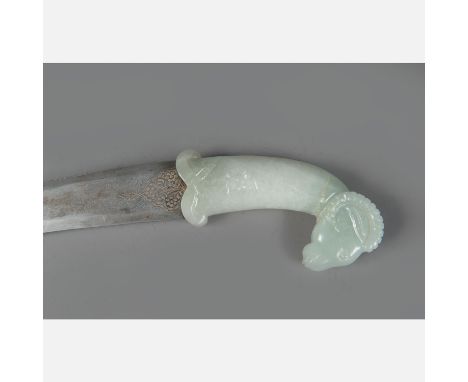 Jambiya, peaked blade with damascene and silvered decorations, polished. Green white carved jade grip in shape of a rams head