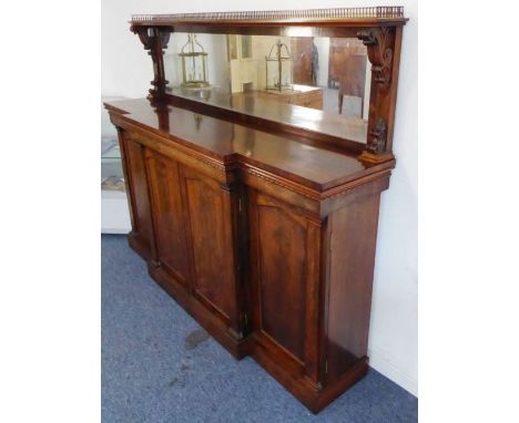 A fine early 19th century Regency period rosewood breakfront chiffonier; the three-quarter pierced gilt-metal balustrade abov