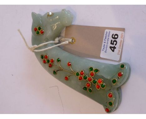 A carved pale celadon coloured hardstone (jade?) Mughal-style dagger handle modelled as a 'bejewelled' horse's head and elong