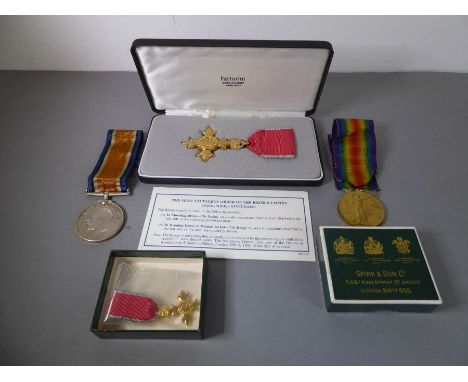 A modern OBE (mint condition) in its Fattorini case and two London Rifle Brigade WW1 medals: the Victory and British War Meda