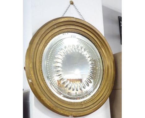 A 19th century circular gilt-framed wall-hanging looking glass having intaglio border surrounding an etched flowerhead design