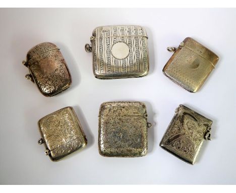 Six late 19th to early 20th century&nbsp;hallmarked silver vesta cases. Four with foliate-style engraving, two with engine tu