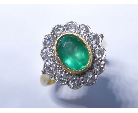 A Columbian emerald and diamond cluster ring