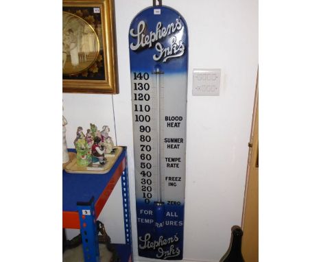A rare oversized floor-standing enamel advertising thermometer 'Stephens' Inks'; the glass thermometer intact and the wooden 