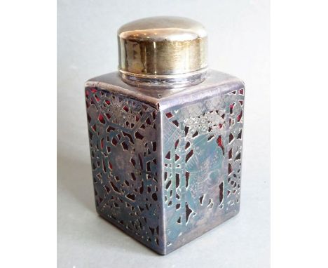 An early 20th century cranberry glass and silver overlay tea caddy; the body decorated with two opposing sides of Chinamen pi