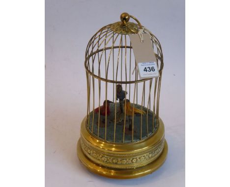 A polished brass-cased three singing birds automaton (appears to be in good working order) (27cm high)