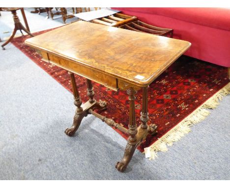 A good mid-19th century highly figured walnut foldover-top card table; the moulded top opening to reveal green baize and gilt