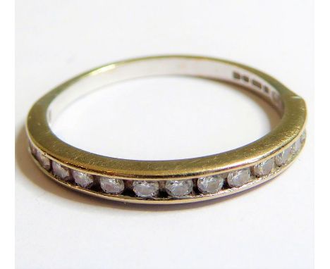 An 18-carat white gold (marked 750) half-eternity ring set with diamonds, ring size K/L (approx. 1.77g)