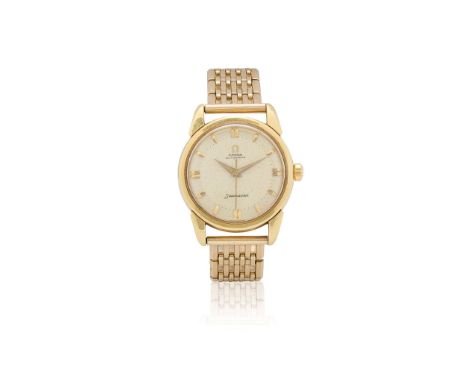  Omega. An 18k gold automatic wristwatch on a 9k gold bracelet Seamaster, Case No.958661, Movement No.15187994, case hallmark