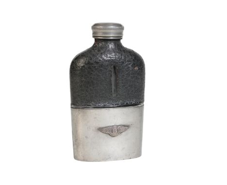 A BENTLEY HIP FLASK with the 'Flying B' badge to the front, 12cm high