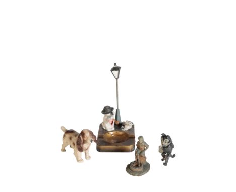 A 1920'S DIECAST MODEL OF FELIX THE CAT with a note attached reading 'My favourite toy at the age of 3, 4, &amp; 5' H. S. R. 