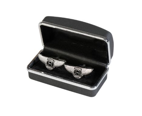 A PAIR OF BENTLEY CUFFLINKS with silver plate and enamel Bentley crests, and a pair of Rolls Royce cufflinks, silver plate an