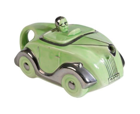 A LIGHT GREEN SADLER 'OKT42' MOTORCAR TEAPOT with chrome wings, 22cm long