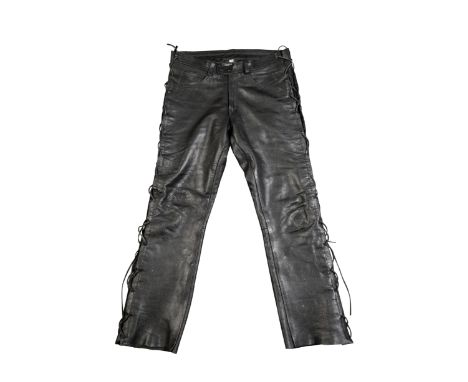 A PAIR OF BIKER'S GEARBOX LEATHER LACED JEANS with a Harley Davidson buckle, 32"waist, and two further pairs of leather laced