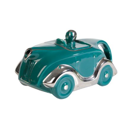 A TEAL SADLER 'OKT42' MOTORCAR TEAPOT with chrome wings, 22cm long