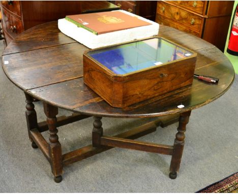 A 19th century oak gate leg table 