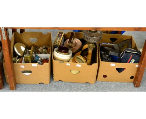 A corinthuim column oil lamp, copper kettle, plated flatware, a pair of brass candlesticks, two bowling green balls, cameras,