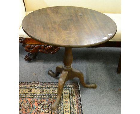 A mahogany tripod table 