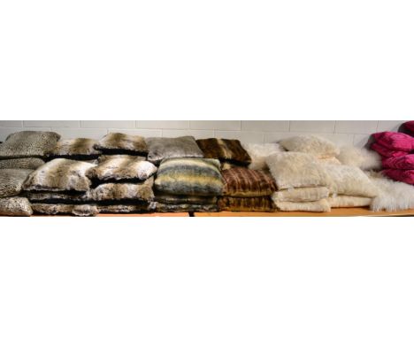 Sixty assorted faux fur and animal print cushions including Jonelle 
