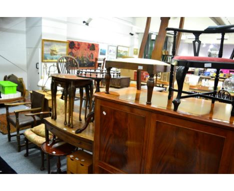 An early 20th century oak elbow chair, a 19th Century mahogany open arm chair, a George III bow fronted side table, a Brights