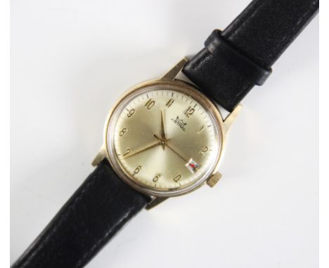 A gentleman's vintage Astral wristwatch, the circular gold toned dial with Arabic numerals and date window to three 'o' clock