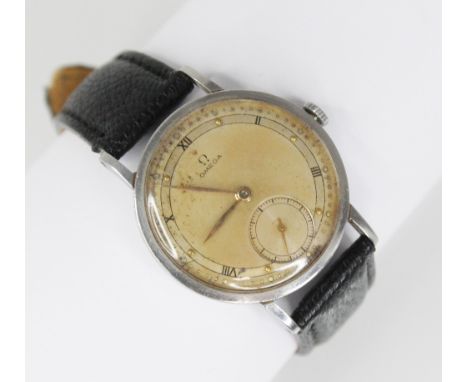 A gentleman's 1950's Omega wristwatch, circular dial, Roman numerals and dot markers, outer minutes track and subsidiary dial