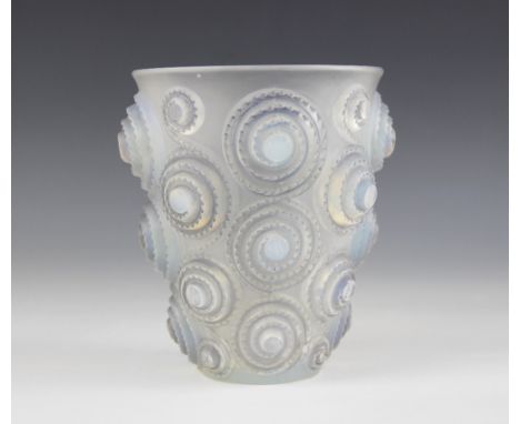A René Lalique (French, 1860-1945) "Spirales" opalescent, frosted and blue stained glass vase, model no. 1060, moulded with c