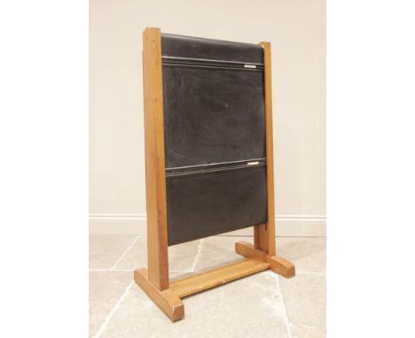A mid-century school roller blackboard by 'Wilson &amp; Garden, Kilsyth, Glasgow', the roller mechanism and board raised upon